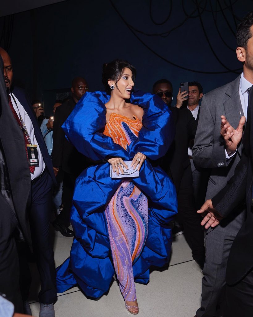 Nora Fatehi stuns in a magnificent royal blue gown,